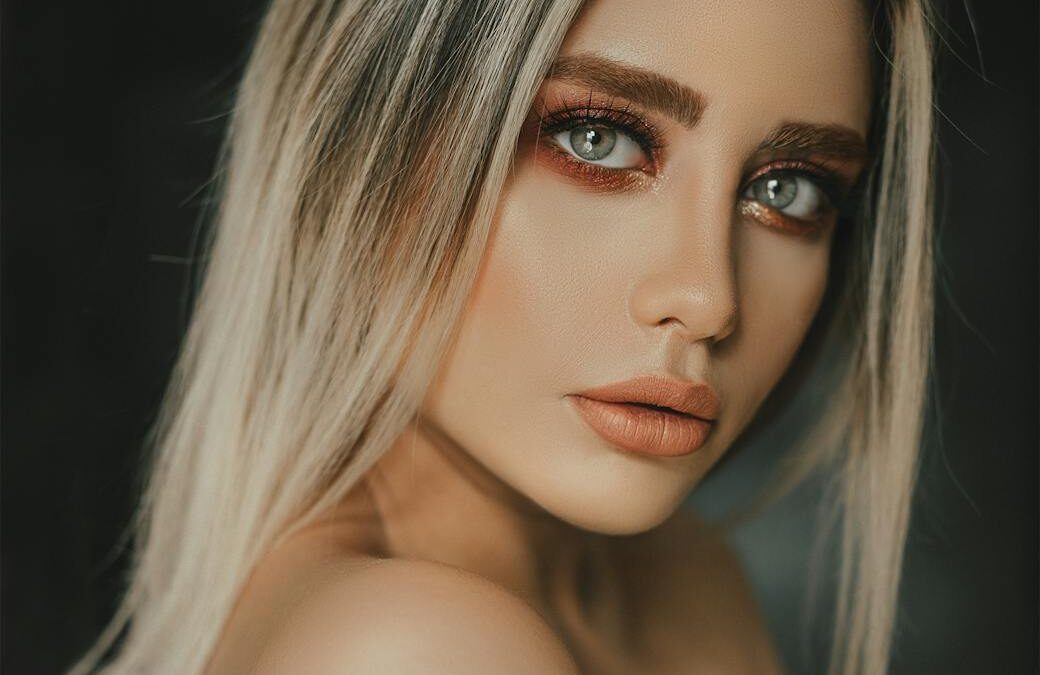 selective focus photography of woman wearing white dress